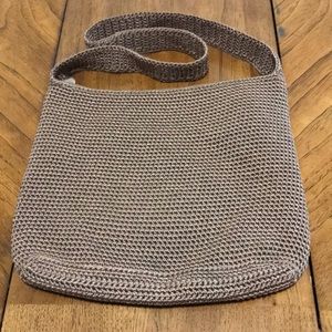The Sak Beige Woven Shoulder Bag.